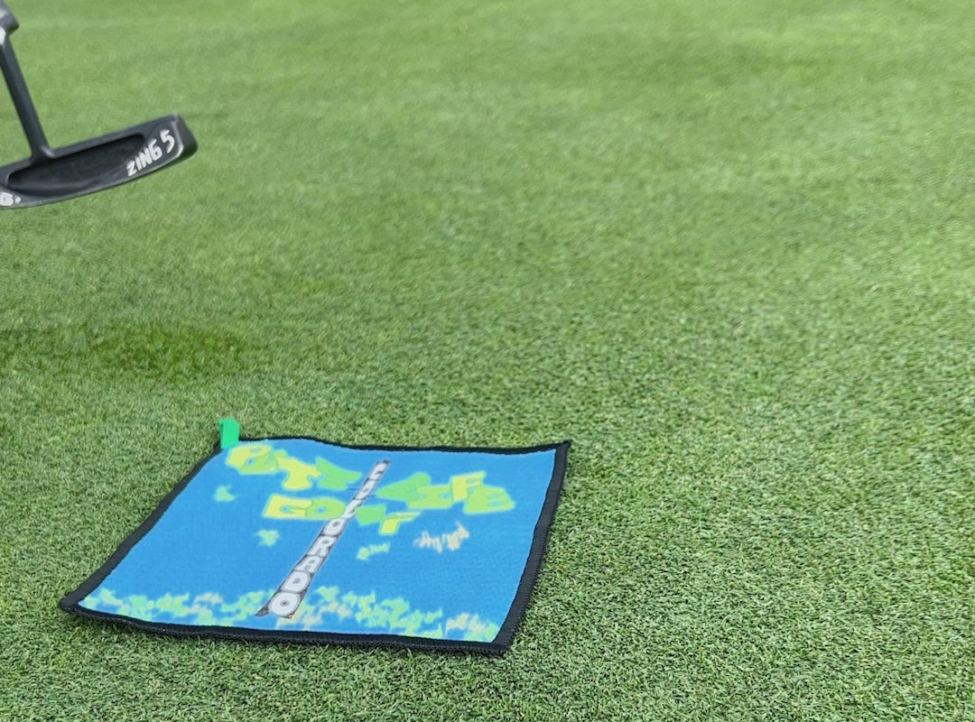Load video: video clip showing the power of magnets! Three clips of different putt life pocket towels being snatched from the ground using a putter. Magnets!!!